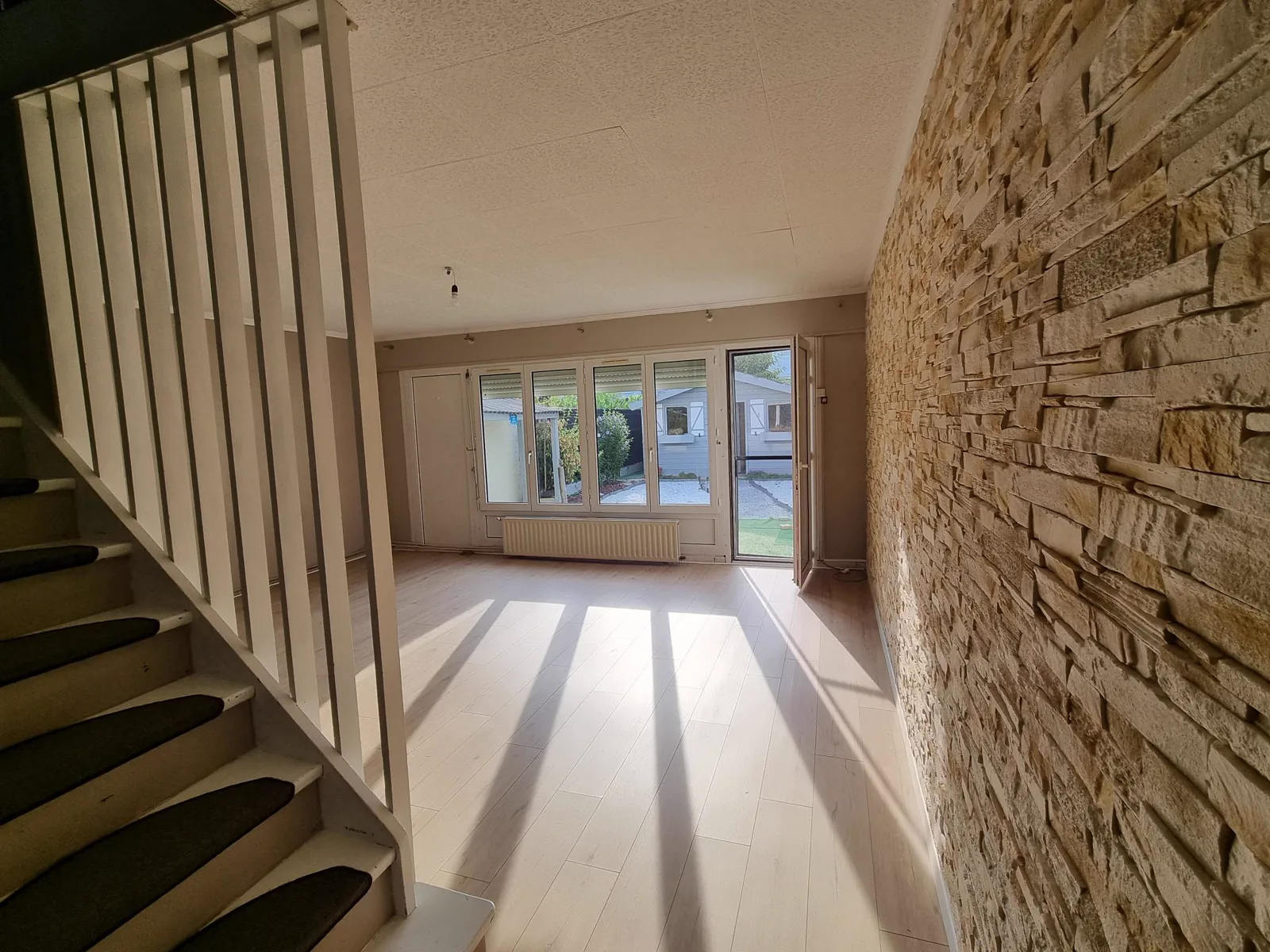 Séjour avec baie sur le jardin, maison à Villeneuve-d'Ascq